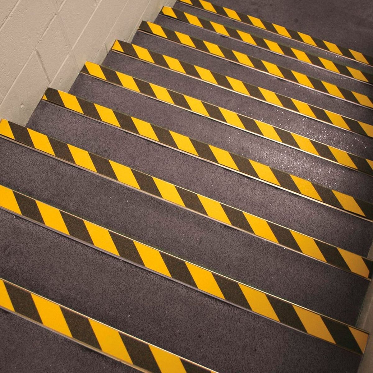 Staircase with black and yellow striped safety treads